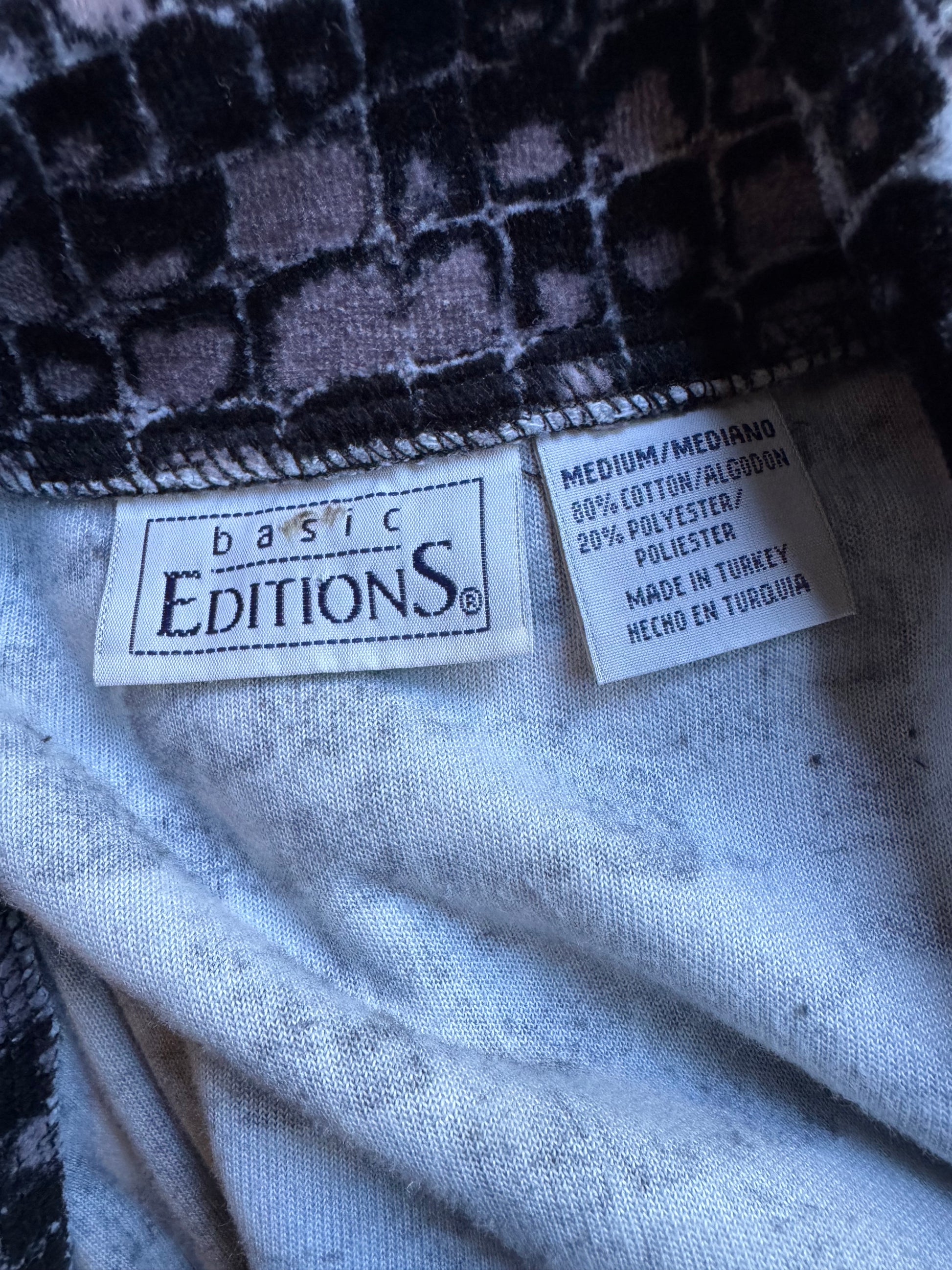 Close-up of fabric with a label and pattern