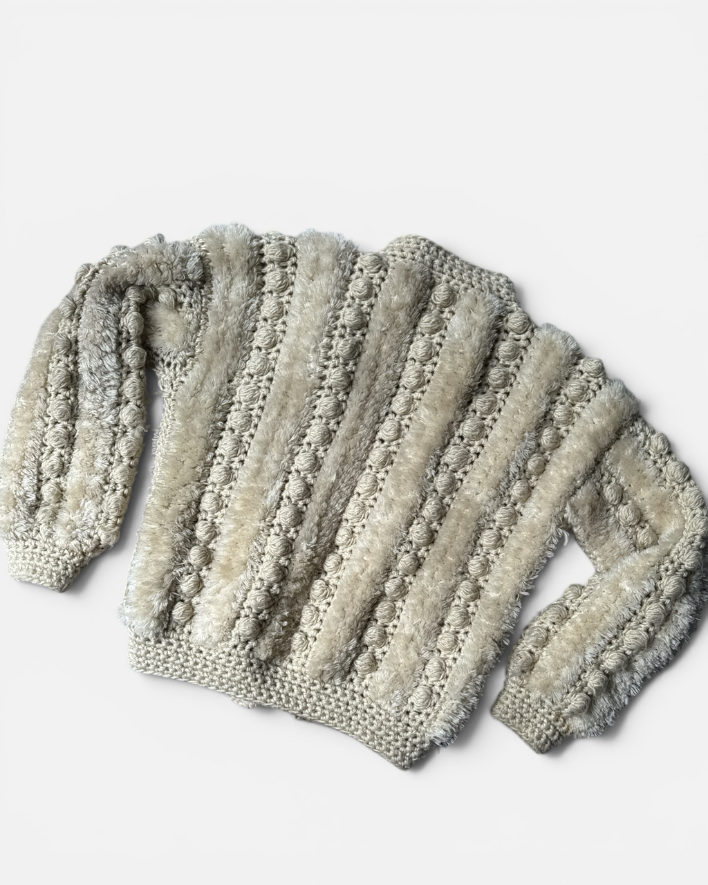Highway Robbery Vintage cream crochet cardigan with fuzzy yarn panels and bobble-stitch texture.