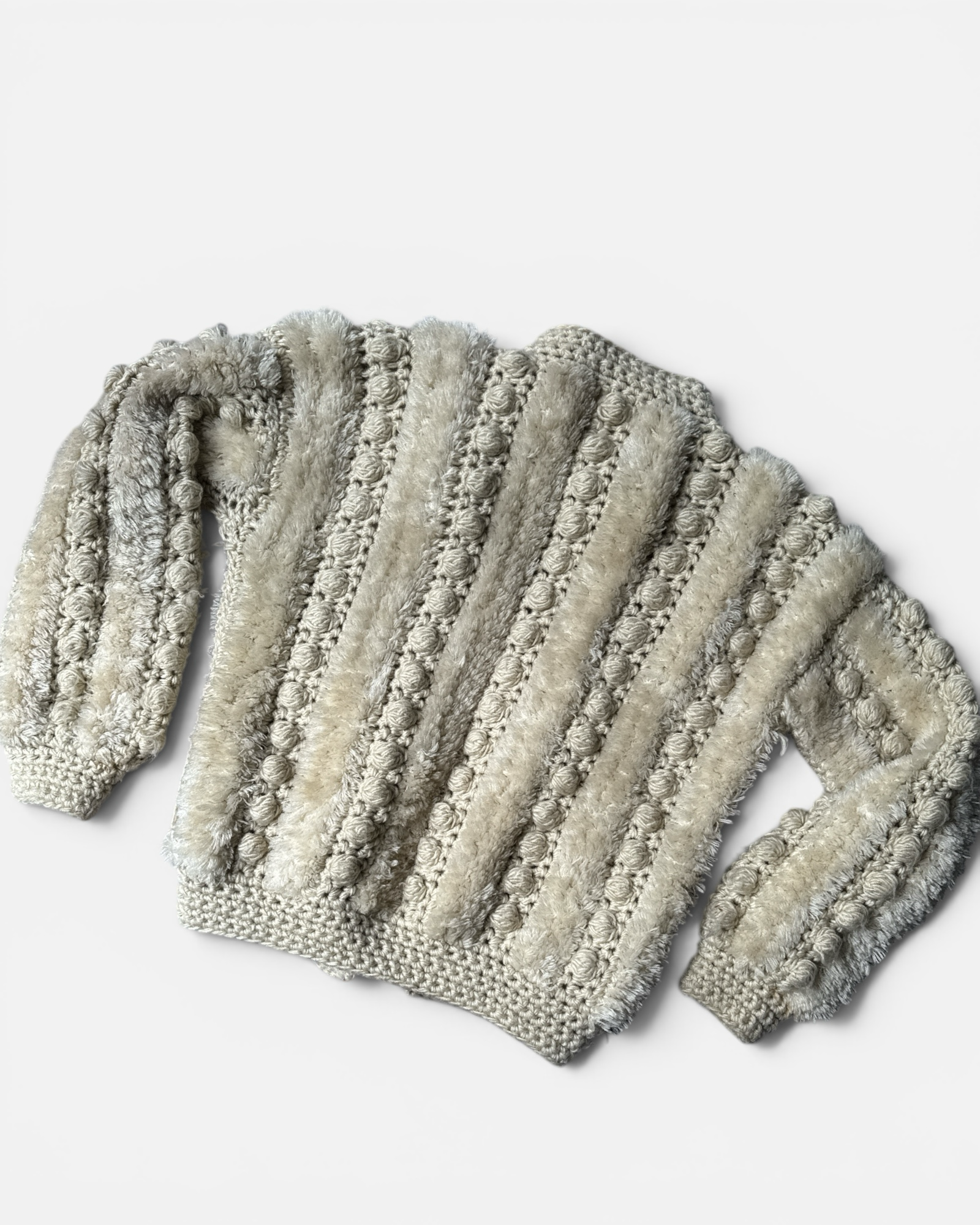 Highway Robbery Vintage cream crochet cardigan with fuzzy yarn panels and bobble-stitch texture.
