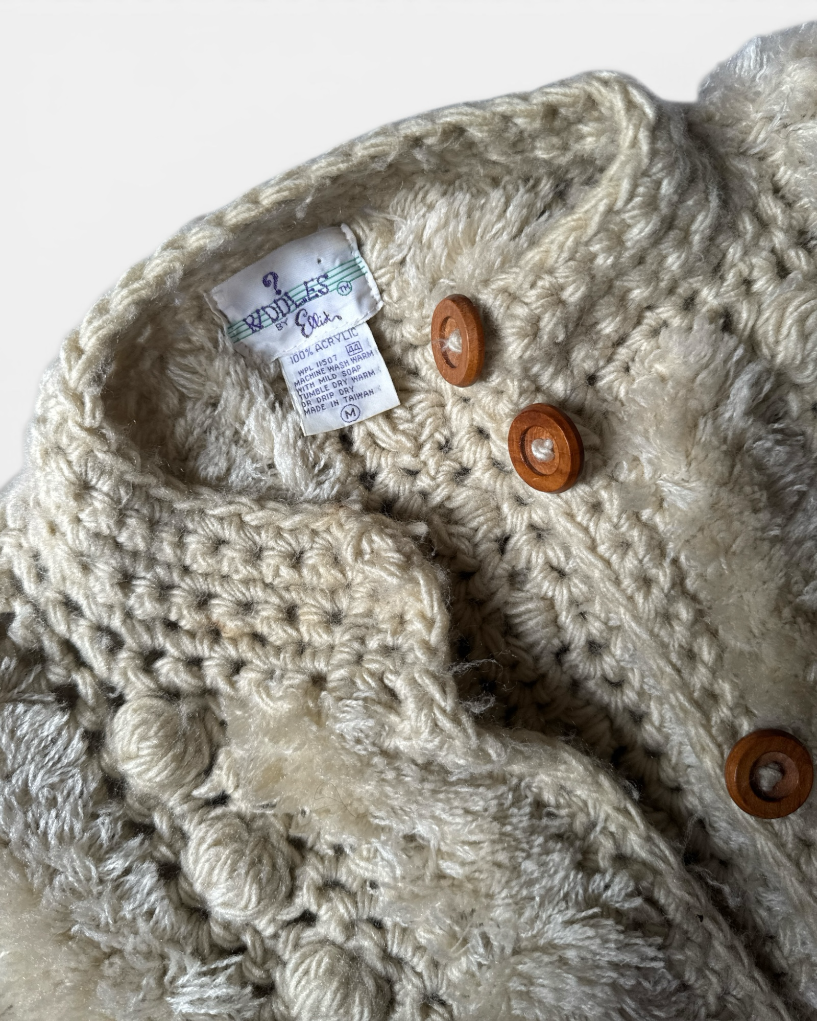 Highway Robbery Vintage Riddles by Ellin cream crochet cardigan with textured bobble stitch and wooden buttons.
